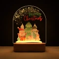 Personalizowana lampka LED dla dzieci z piękną świąteczną ilustracją przedstawiającą Mikołaja, bałwanka i zwierzątka na tle choinki, idealna na prezent bożonarodzeniowy oraz dekorację pokoju dziecięcego na święta.