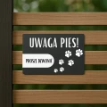 Tabliczka „Uwaga Pies!” antracytowa, wzór 7, ozdobiona śladami łapek i napisem „Proszę Dzwonić”.