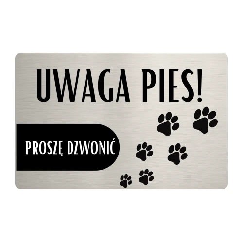 Tabliczka „Uwaga pies!” wykonana ze stali szczotkowanej z napisem „Proszę dzwonić” i dekoracyjnymi śladami łapek.