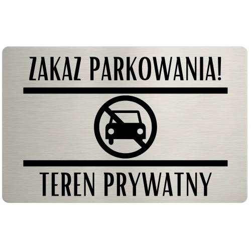 Tabliczka ostrzegawcza z napisem „Teren prywatny – zakaz parkowania”.