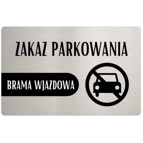 Tabliczka z zakazem postoju i parkowania przy wjeździe.